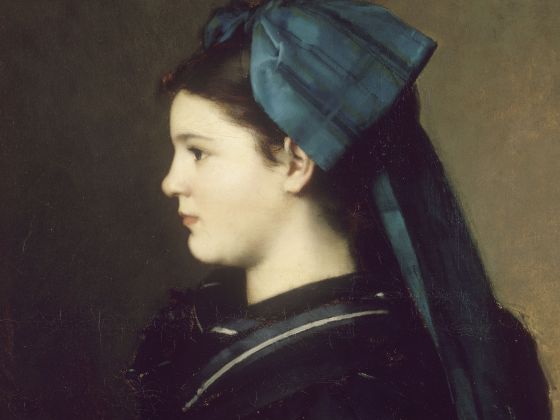 Eugénie Henner en alsacienne, tenant un panier de pommes